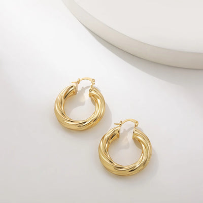 Punk Gold Color Twist Round Piercing Hoop Earrings Female Luxury CZ Crystal Geometric Ear Buckle Huggie Earrings Women Jewelry