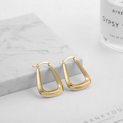 Punk Gold Color Twist Round Piercing Hoop Earrings Female Luxury CZ Crystal Geometric Ear Buckle Huggie Earrings Women Jewelry