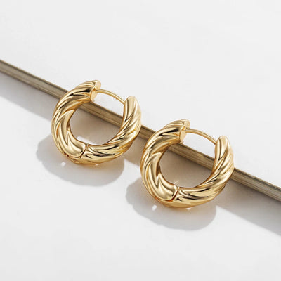 Punk Gold Color Twist Round Piercing Hoop Earrings Female Luxury CZ Crystal Geometric Ear Buckle Huggie Earrings Women Jewelry