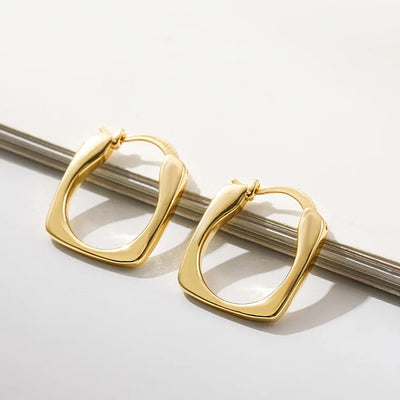 Punk Gold Color Twist Round Piercing Hoop Earrings Female Luxury CZ Crystal Geometric Ear Buckle Huggie Earrings Women Jewelry