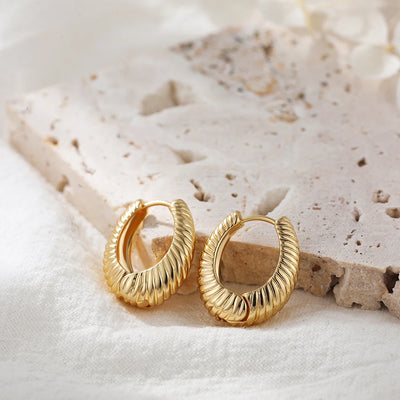 Punk Gold Color Twist Round Piercing Hoop Earrings Female Luxury CZ Crystal Geometric Ear Buckle Huggie Earrings Women Jewelry