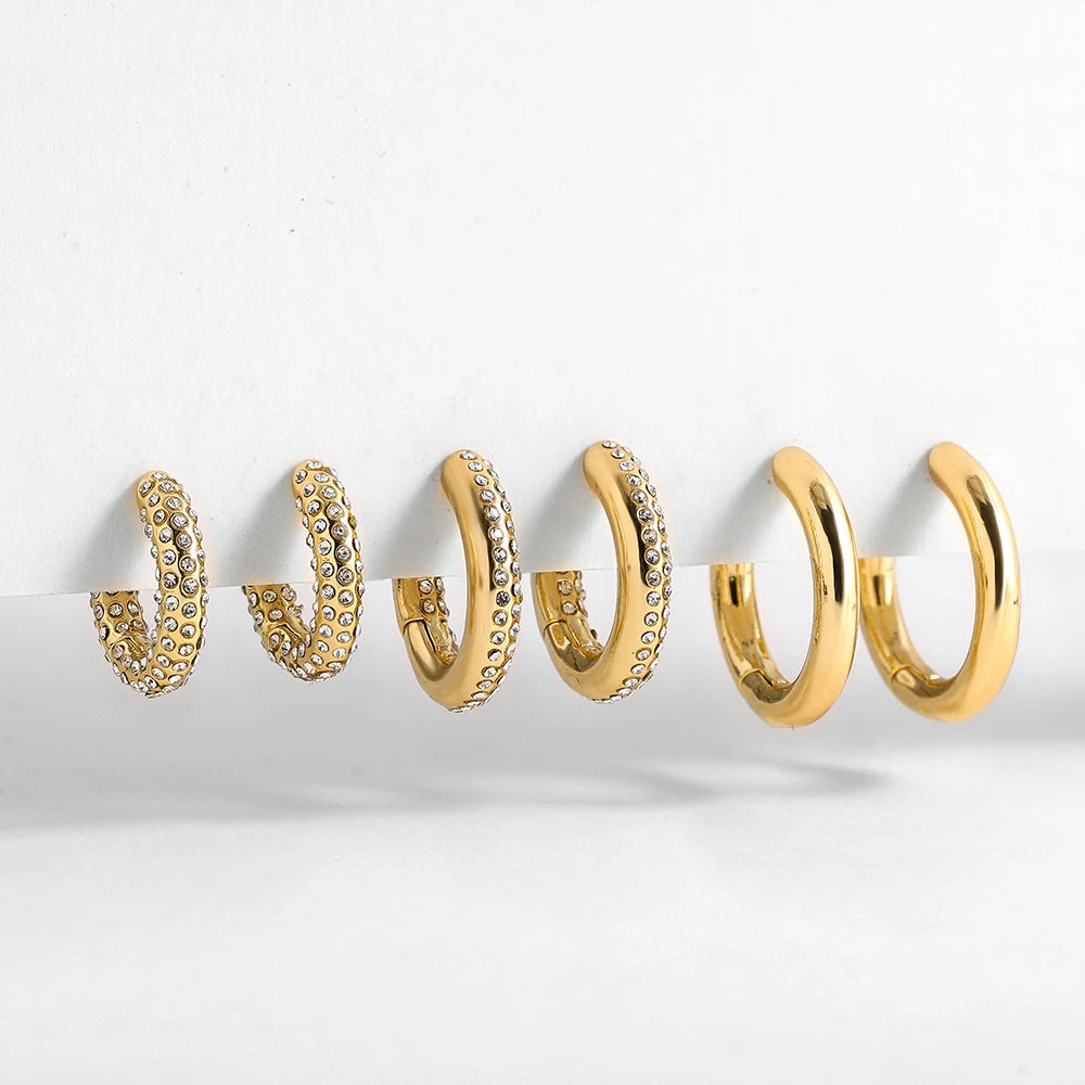 Punk Gold Color Twist Round Piercing Hoop Earrings Female Luxury CZ Crystal Geometric Ear Buckle Huggie Earrings Women Jewelry