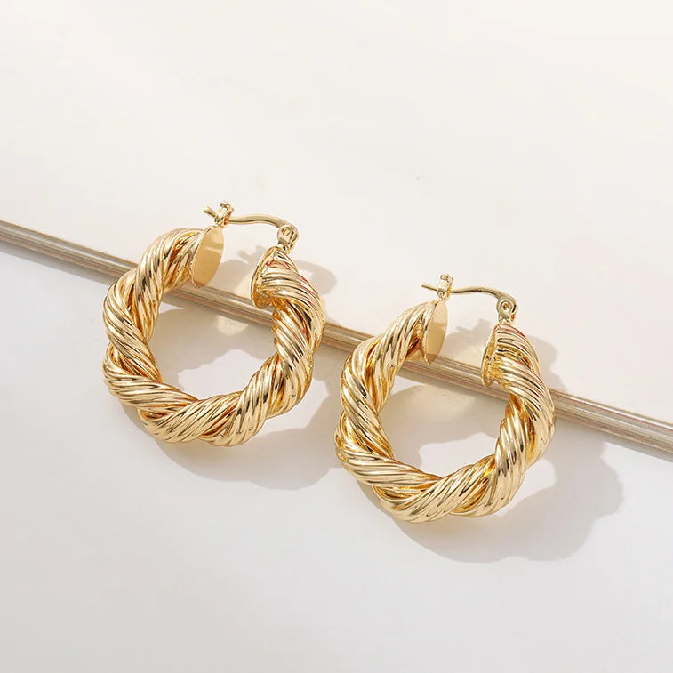 Punk Gold Color Twist Round Piercing Hoop Earrings Female Luxury CZ Crystal Geometric Ear Buckle Huggie Earrings Women Jewelry