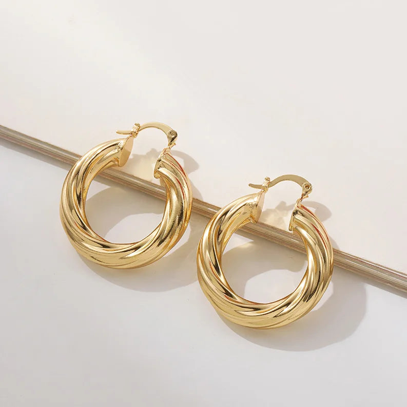 Punk Gold Color Twist Round Piercing Hoop Earrings Female Luxury CZ Crystal Geometric Ear Buckle Huggie Earrings Women Jewelry
